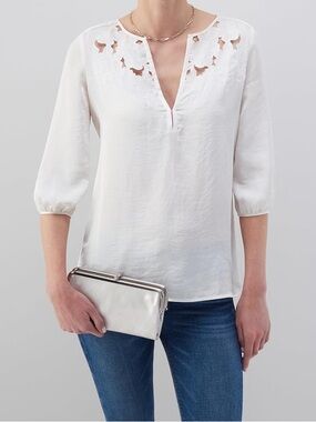 Hobo Lauren leather clutch wallets in white
